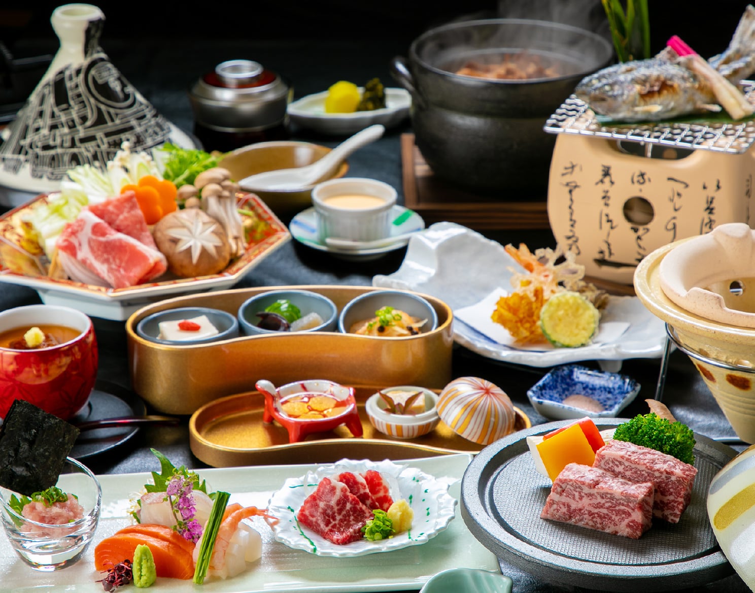 旅館 翠嵐楼 — 熊本県人吉市 · 球磨川の天然鮎を主役にした会席料理、鮎の塩焼きと山女の刺身