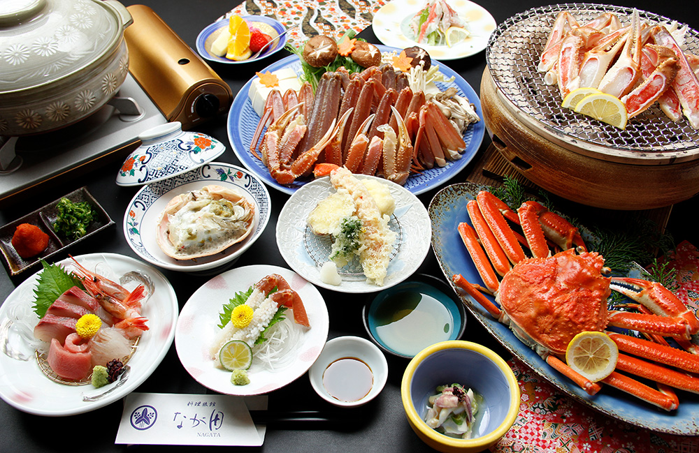 料理旅館 なが田 — 福井・若狭町海山 · 三方五湖畔の宿が供するずわい蟹の会席、刺し・焼き・鍋を一膳に並べた冬の献立