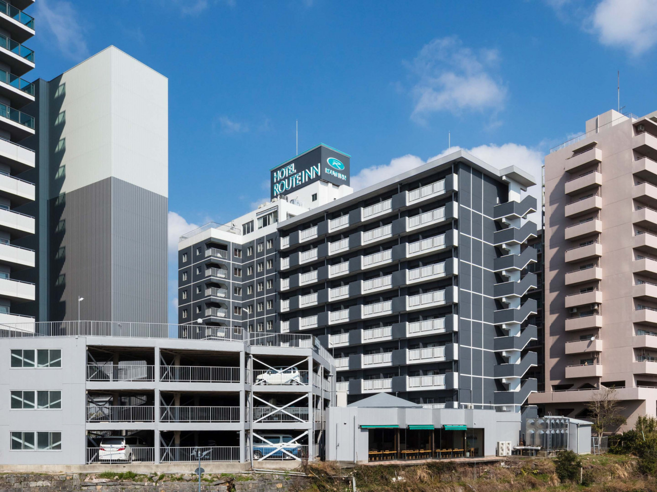 ホテルルートイン熊本駅前 — 熊本市西区春日 · JR熊本駅白川口から徒歩約3分、総客室数170室の外観と立体駐車場